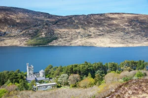 Hillside Gallery: Glenveagh castle on lake Lough Beagh in the Glenveagh National Park, County Donegal