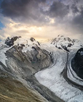 Gorner Glacier (Gornergletscher) with majestic Lyskamm and Monte Rosa peaks at sunset Gorner Glacier (Gornergletscher) with majestic Lyskamm and Monte Rosa peaks at sunset