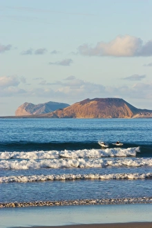 Graciosa Island beyond Lanzarotes finest surf beach at Famara in the north west of the island Graciosa Island beyond Lanzarotes finest surf beach at Famara in the north west of the island