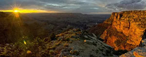 Grand Canyon viewed west of Moran Point at sunset with an approaching storm on the right Grand Canyon viewed west of Moran Point at sunset with an approaching storm on the right