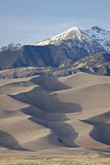 Great Sand Dunes and mountains with snow, Great Sand Dunes National Park and Preserve Great Sand Dunes and mountains with snow, Great Sand Dunes National Park and Preserve