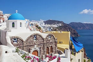 Greek church of St. Nicholas with blue dome, Oia, Santorini (Thira), Cyclades Islands, Greek Islands, Greece, Europe