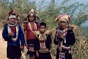 Group from the Aka (Akha) Hill Tribe in traditional dress Group from the Aka (Akha) Hill Tribe in traditional dress