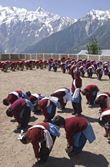Group of school children in uniform during morning Group of school children in uniform during morning