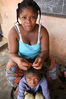 Images Dated 29th October 2011: Hairdresser at home, Lome, Togo, West Africa, Africa