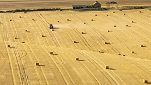 Hay bales on rolling chalk fields near the village of Fridaythorpe, on the East Yorkshire Hay bales on rolling chalk fields near the village of Fridaythorpe, on the East Yorkshire