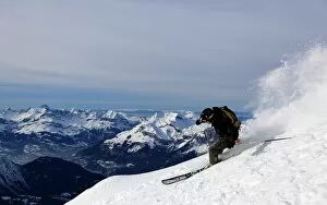 Skier Gallery: A highly skilled skier making a very fast descent of the extremely steep off-piste run known as