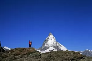 Hiker Gallery: Hikers on rocks and the Matterhorn