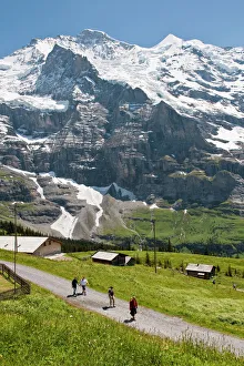 Hiking below the Jungfrau massif from Kleine Scheidegg, Jungfrau Region Hiking below the Jungfrau massif from Kleine Scheidegg, Jungfrau Region