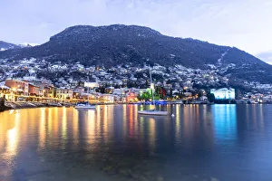 Historic buildings of Gravedona with Christmas Lights during a winter sunrise, Lake Como Historic buildings of Gravedona with Christmas Lights during a winter sunrise, Lake Como