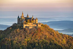 Hohenzollern castle in autumnal scenery at dawn, Hechingen, Baden-Wurttemberg, Germany Hohenzollern castle in autumnal scenery at dawn, Hechingen, Baden-Wurttemberg, Germany