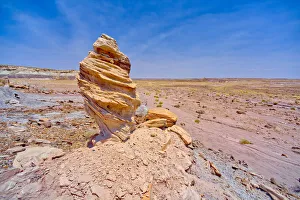A hoodoo formation called Medusa's Child, below the cliffs of Agate Plateau in A hoodoo formation called Medusa's Child, below the cliffs of Agate Plateau in