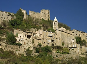 Houses, church and old walls at Montbrun les Bains in Drome, Rhone-Alpes, France, Europe Houses, church and old walls at Montbrun les Bains in Drome, Rhone-Alpes, France, Europe