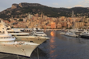 Monte Carlo Gallery: Huge super yachts in the glamorous Port of Monaco (Port Hercules) at sunrise, from the sea