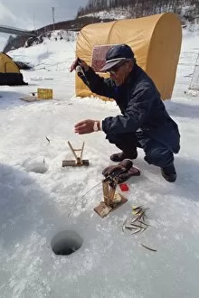 https://www.mediastorehouse.com/t/191/ice-fishing-minami-furano-lake-hokkaido-japan-3663633.jpg.webp