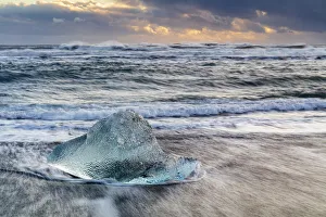 Vatnajokull National Park Gallery: Iceberg from melting glacier on black sand beach near Jokulsarlon glacier lagoon