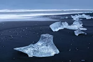 Vatnajokull National Park Gallery: Icebergs from melting glacier on black sand beach near Jokulsarlon glacier lagoon