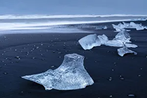 Vatnajokull National Park Gallery: Icebergs from melting glacier on black sand beach near Jokulsarlon glacier lagoon