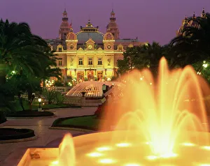 Prints of Illuminated fountains in front of the casino at Monte Carlo, Monaco, Europe Monaco Prints: WorldInPrint: Monte Carlo Casino Fountains Illuminated Print