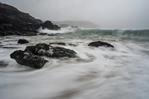Incoming tide, Clogher Bay, Clogher, Dingle Peninsula, County Kerry, Munster, Republic of Ireland Incoming tide, Clogher Bay, Clogher, Dingle Peninsula, County Kerry, Munster, Republic of Ireland