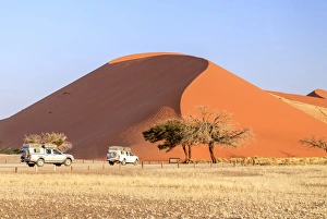 The jeep around Dune 45 composed of 5 million years of sand, Sossusvlei, Namib Desert The jeep around Dune 45 composed of 5 million years of sand, Sossusvlei, Namib Desert