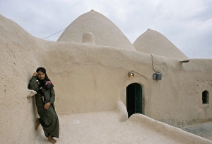 Jinar, 15 year old girl in front of a 200 year old Jinar, 15 year old girl in front of a 200 year old