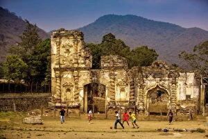 Related Images Gallery: Kids playing soccer at ruins in Antigua, Guatemala, Central America