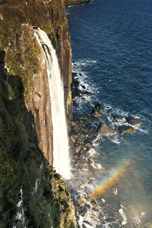 Kilt waterfall falling directly into the sea on the Isle of Skye, Inner Hebrides Kilt waterfall falling directly into the sea on the Isle of Skye, Inner Hebrides