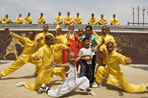 Kung fu students displaying their skills at a tourist show within Shaolin Temple Kung fu students displaying their skills at a tourist show within Shaolin Temple