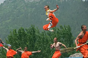 Kung fu students displaying their skills at a tourist show within Shaolin Temple Kung fu students displaying their skills at a tourist show within Shaolin Temple