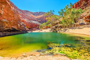 Landscape of Ormiston Gorge Water Hole with ghost gum in West MacDonnell Ranges, Northern Landscape of Ormiston Gorge Water Hole with ghost gum in West MacDonnell Ranges, Northern