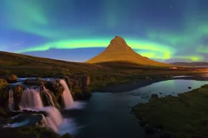 Prints of Aurora (Northern Lights) over a moonlit Kirkjufell Mountain, Snaefellsnes Peninsula, Iceland, Polar Regions Iceland Prints: Aurora over a Moonlit Kirkjufell Mountain Print