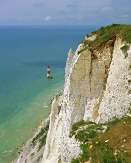 Lighthouse and chalk cliffs at Beachy Head, near Eastbourne, East Sussex, England, UK Lighthouse and chalk cliffs at Beachy Head, near Eastbourne, East Sussex, England, UK