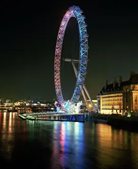 London Eye illuminated by moving coloured lights, London, England, United Kingdom, Europe London Eye illuminated by moving coloured lights, London, England, United Kingdom, Europe