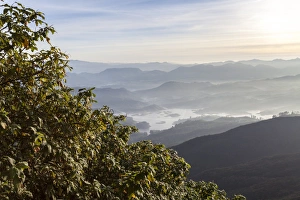 Looking down into the Dalhousie and the Hill Country beyond at sunrise from Adams Peak Looking down into the Dalhousie and the Hill Country beyond at sunrise from Adams Peak