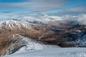 Wester Ross Gallery: Looking down into Fionngleann in winter from Brothers Ridge in Kintail with the hills of