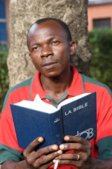 Man reading the Bible, Lome, Togo, West Africa, Africa Man reading the Bible, Lome, Togo, West Africa, Africa