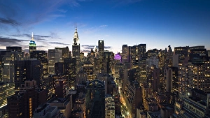 Manhattan skyline with the Chrysler Building and Empire State Building at dusk, New York Manhattan skyline with the Chrysler Building and Empire State Building at dusk, New York