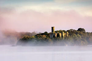 Ireland Collection: McDermotts Castle sits on Lough Key or Castle Island in County Roscommon