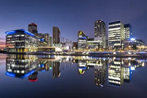 MediaCityUK reflected in North Bay at night, Salford Quays, Salford, Manchester, England, United Kingdom, Europe MediaCityUK reflected in North Bay at night, Salford Quays, Salford, Manchester, England, United Kingdom, Europe