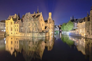 Belfries of Belgium and France Gallery: The medieval Belfry and historic buildings reflected in Rozenhoedkaai canal at night