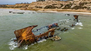 Luanda Collection: Men dismantling a boat on Shipwreck beach, Bay of Santiago, Luanda, Angola, Africa