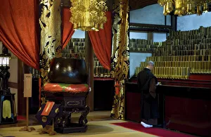 Memorials Gallery: Monk inside Shidoden Memorial Hall at Eiheiji Temple, headquarters of the Soto sect of Zen Buddhism