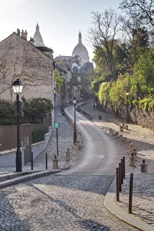 The Montmartre area with the Sacre Coeur basilica in the background, Paris, France, Europe The Montmartre area with the Sacre Coeur basilica in the background, Paris, France, Europe