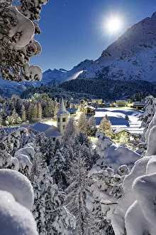 Places Of Worship Gallery: Full moon over Chiesa Bianca covered with snow surrounded by woods, Maloja, Bregaglia Valley