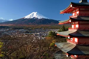 Fuji Gallery: Mount Fuji capped in snow and the upper levels of a temple