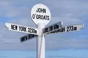 Western Script Gallery: Multi directional signpost, John O Groats, Caithness, Highland Region, Scotland, United Kingdom