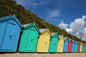 Cabin Gallery: Multicoloured beach huts on the long sweeping beach of Llanbedrog, Llyn Peninsula