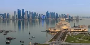 Images Dated 29th March 2013: Museum of Islamic Art with West Bay skyscrapers in background, Doha, Qatar, Middle East