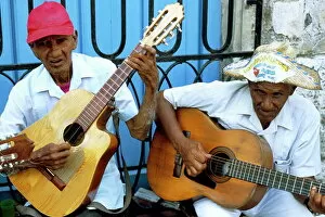 Guitar Gallery: Musicians playing guitars, Havana Viejo, Havana, Cuba, West Indies, Central America